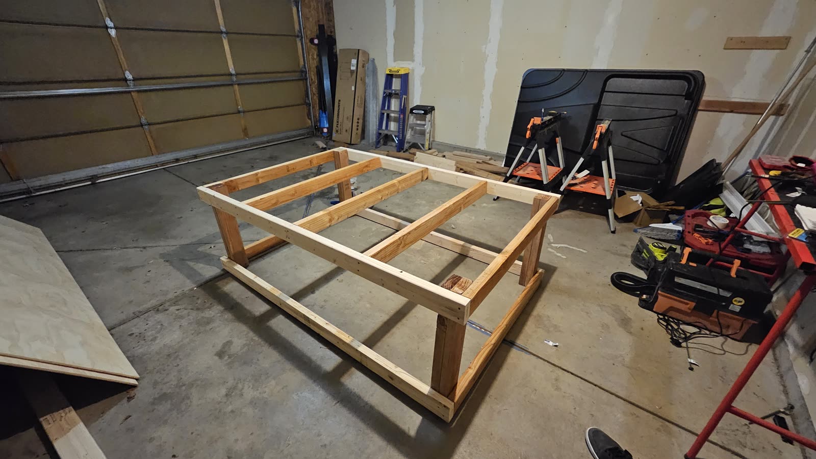 The hen house floor frame built in the garage.